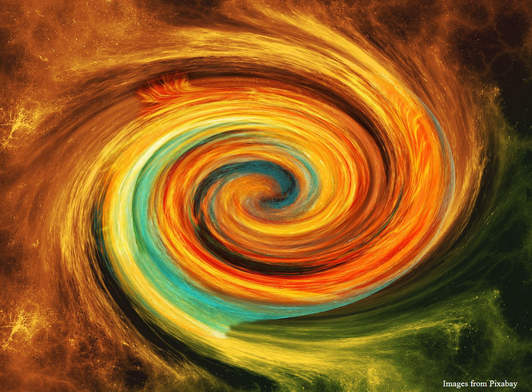 A colourful swirl of mostly orange and other warm colours. The image is from Pixabay.